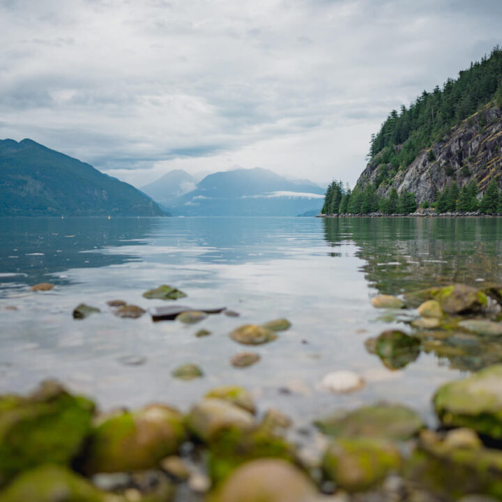 Porteau Cove view from low angle towards Howe Sound and the mountains in the background
