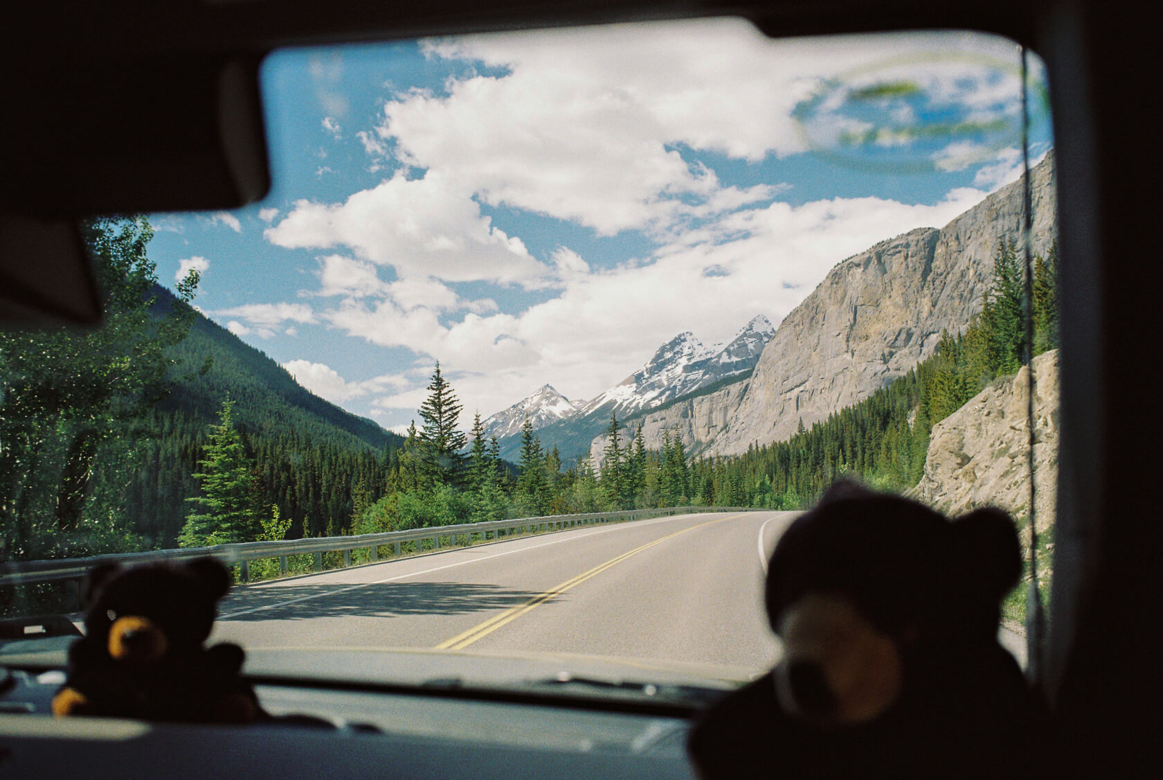 Passenger view through front window on Icefields Parkway
