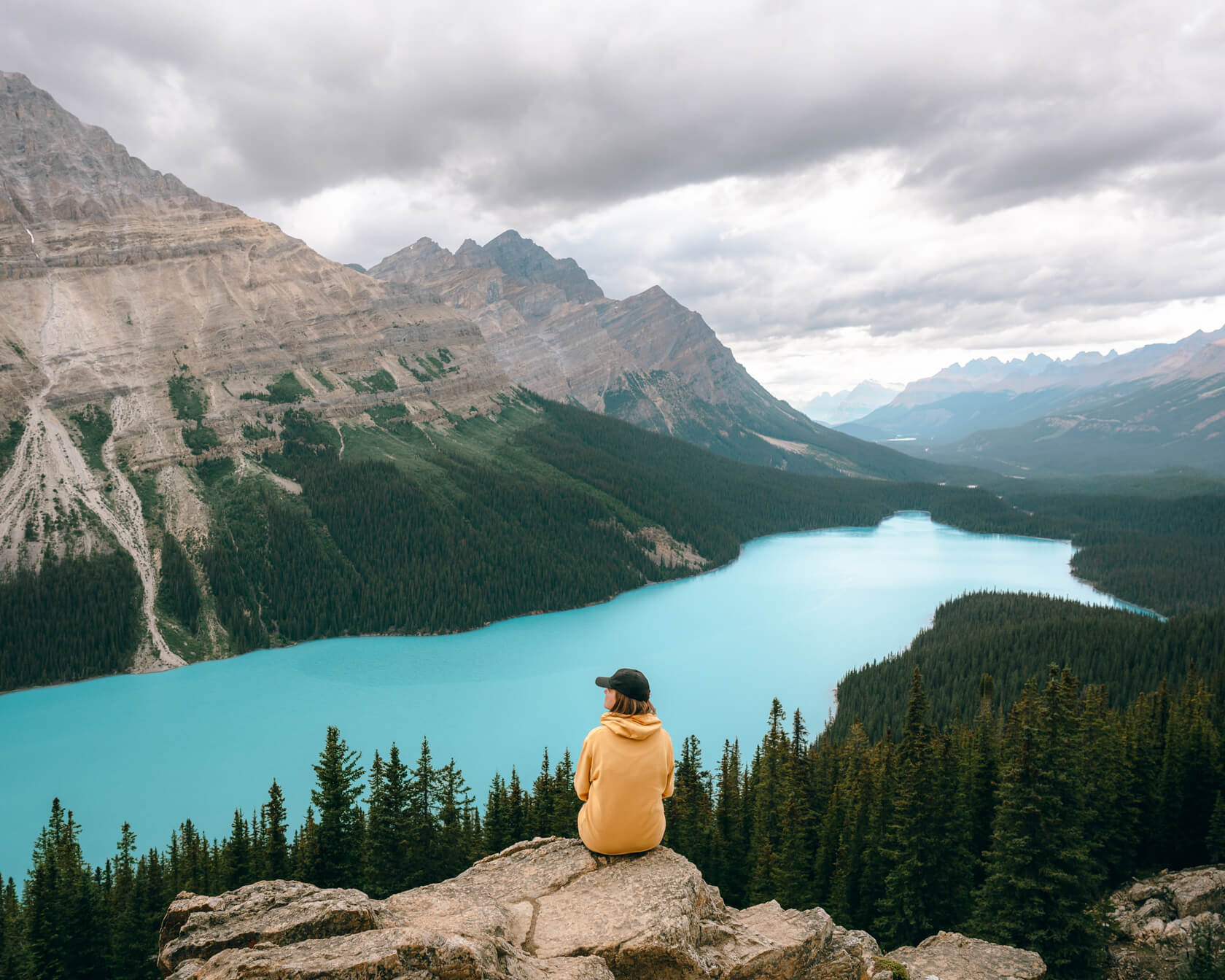 Woman looking at Peyto Lake from above